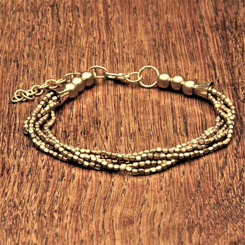 Handmade simple pure brass beaded multi strand, adjustable bracelet designed by OMishka.