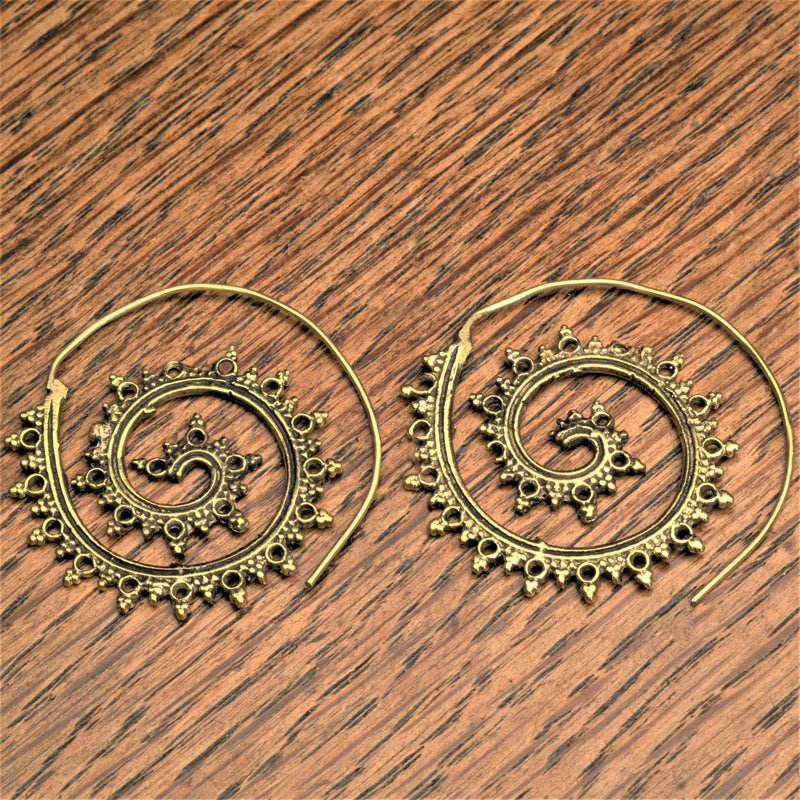 Handmade pure brass, tribal dotted patterned spiral hoop earrings designed by OMishka.