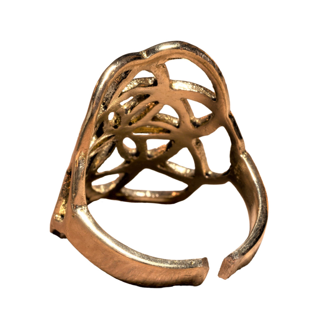 A large, adjustable pure brass, seed of life ring designed by OMishka.