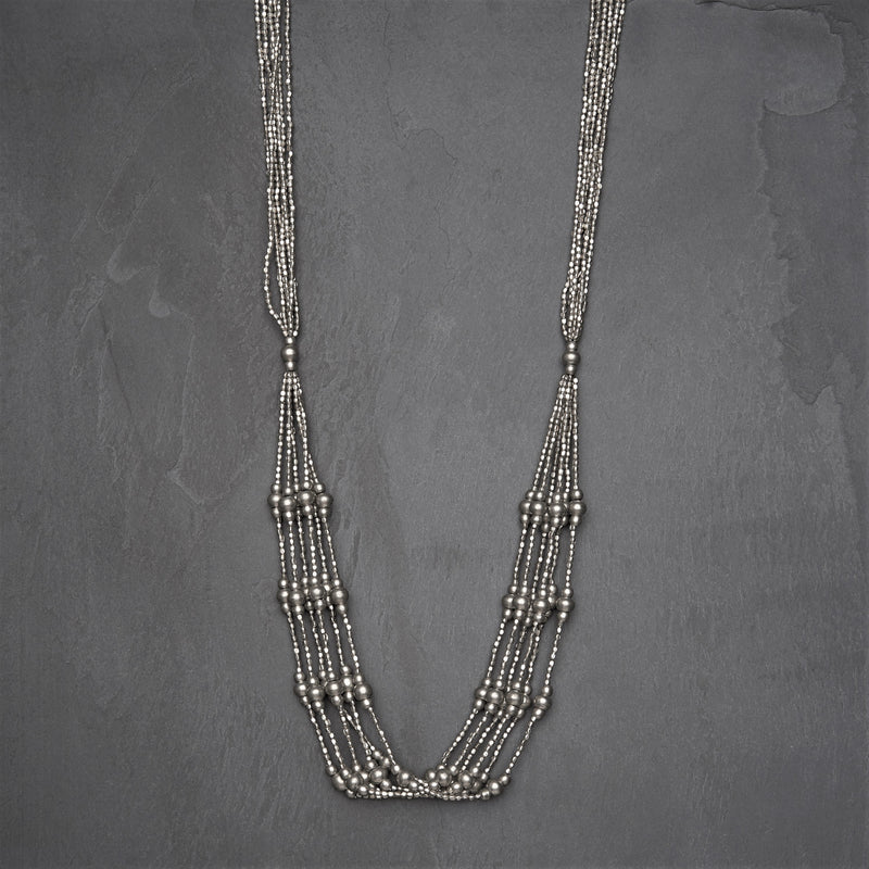Artisan handmade silver, tiny cube and round beaded, long, layered multi strand necklace designed by OMishka.