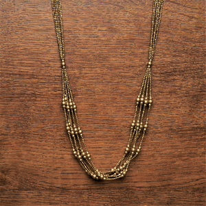 Handmade pure brass tiny cube and round beaded, long, layered multi strand necklace designed by OMishka.