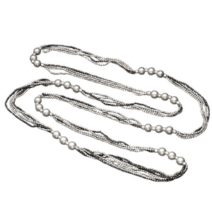 Long, striped, silver toned and black brass beaded, multi strand necklace designed by OMishka.