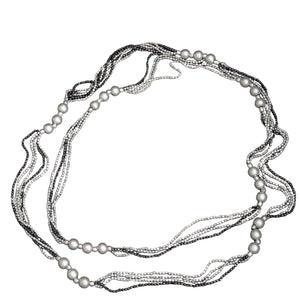 Long, handmade, striped two tone, silver and black beaded, multi strand necklace designed by OMishka.