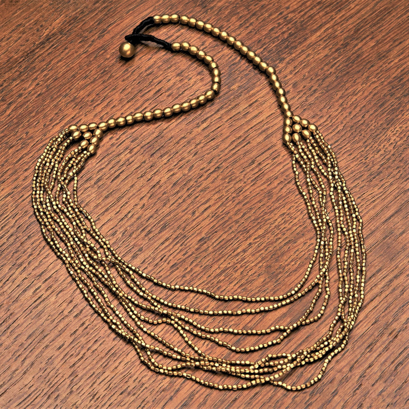 Handmade and nickel free, pure brass tiny cube and round beaded, layered multi strand necklace designed by OMishka.