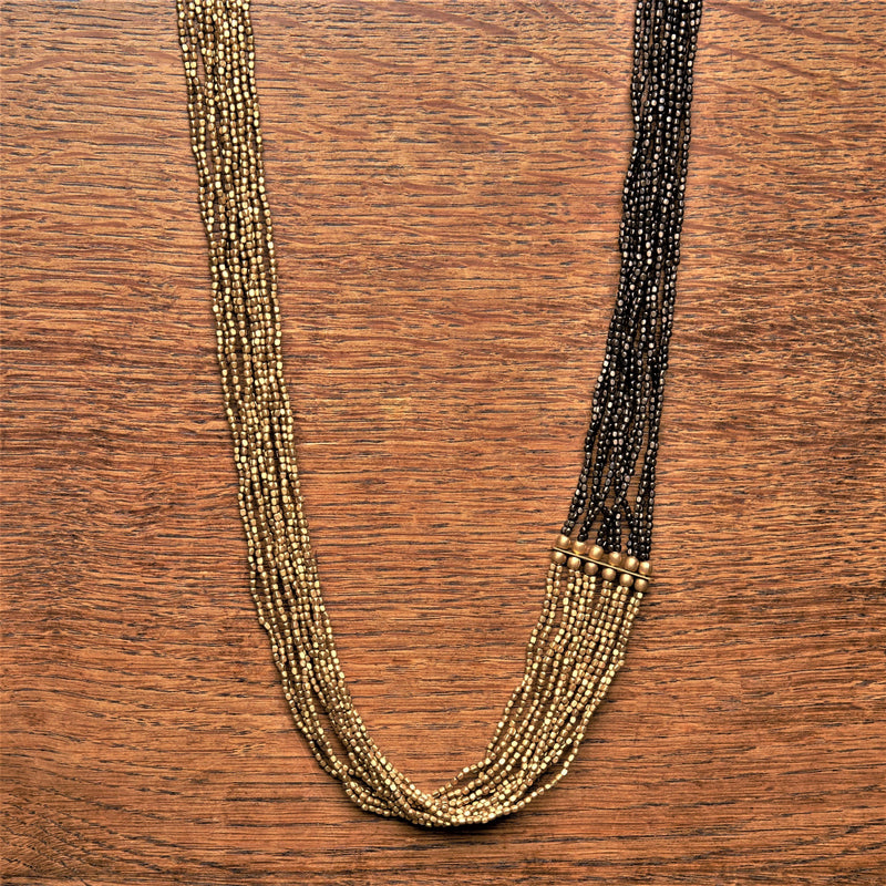 Handmade and nickel free, striped pure golden and black brass, long beaded multi strand necklace designed by OMishka.