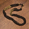 Handmade and nickel free, striped pure golden and black brass, beaded multi strand necklace designed by OMishka.