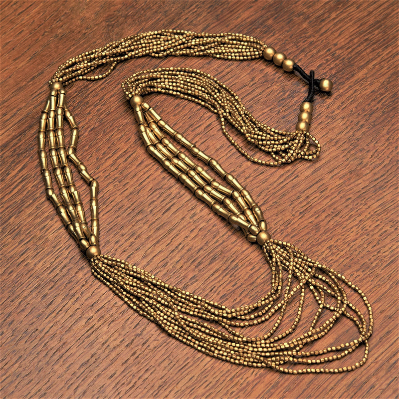 Handmade and nickel free, pure brass, tiny cube and bone beaded, layered multi strand necklace designed by OMishka.