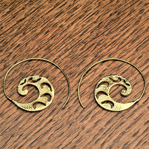 Handmade nickel free pure brass, dainty, crescent and swirl patterned spiral hoop earrings designed by OMishka.