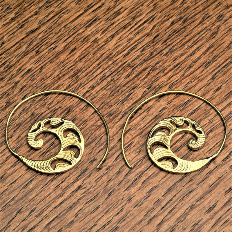 Handmade nickel free pure brass, dainty, crescent and swirl patterned spiral hoop earrings designed by OMishka.