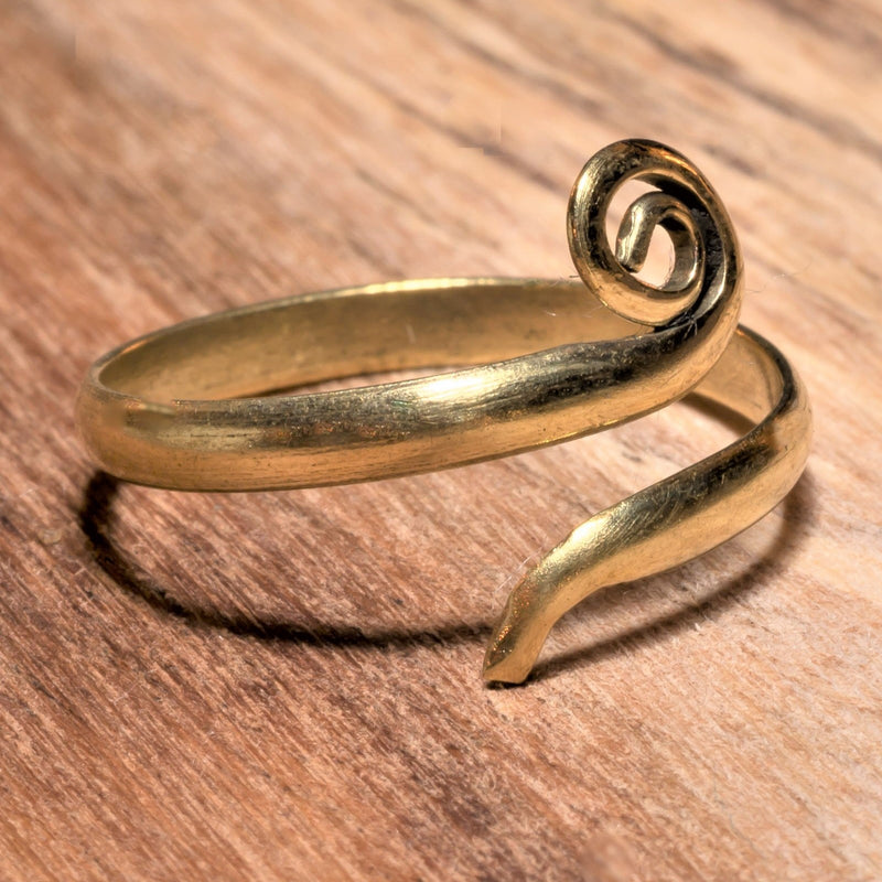 A simple, nickel free pure brass, single spiral wrap ring designed by OMishka.