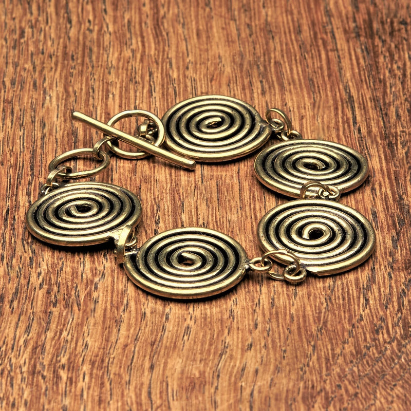 Handmade nickel free pure brass, five spiral detail, smooth textured bracelet designed by OMishka.