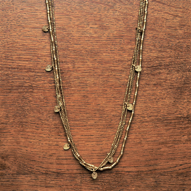 Handmade nickel free pure brass, tiny cube and bone beaded, mini tribal disc, long multi strand necklace designed by OMishka.