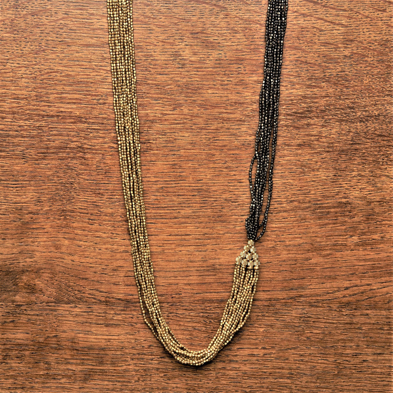 Handmade and nickel free, long, striped golden and oxidised black brass, beaded multi strand necklace designed by OMishka.
