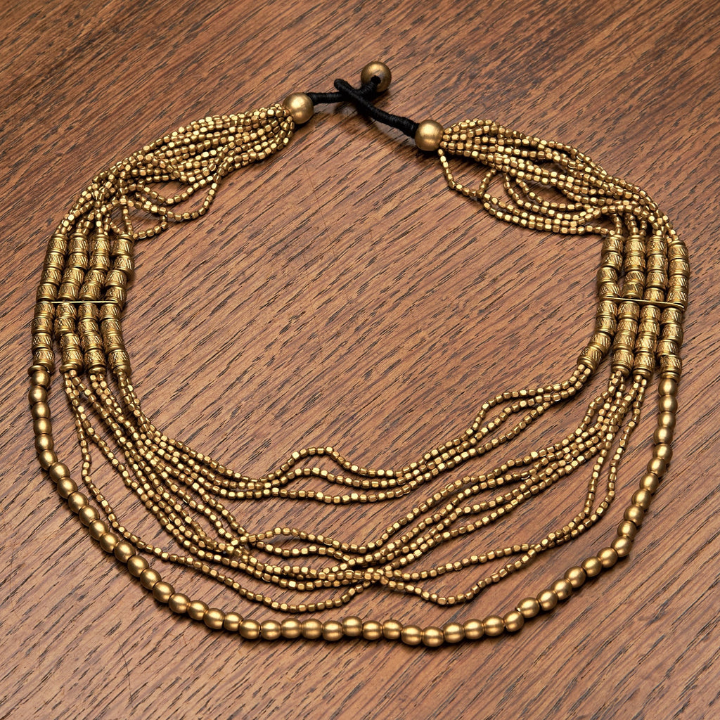 Handmade and nickel free, layered, pure brass beaded multi strand necklace designed by OMishka.