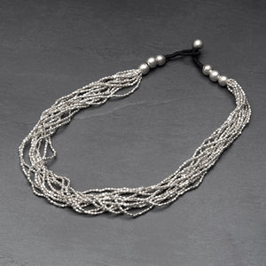 Handmade and nickel free, silver toned brass, simple and elegant tiny cube beaded multi strand necklace designed by OMishka.