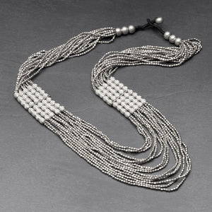 Handmade nickel free silver, tiny cube and charm beaded, layered multi strand necklace designed by OMishka.