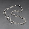 Handmade nickel free silver, tiny cube beaded and mini disc charm, three strand necklace designed by OMishka.