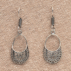 Dainty, nickel free solid silver, open circle filigree, drop earrings designed by OMishka.