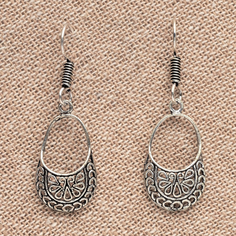 Dainty, nickel free solid silver, open circle filigree, drop earrings designed by OMishka.