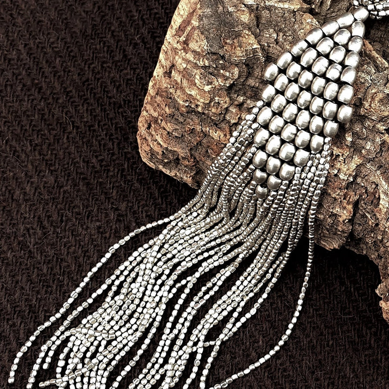Handmade and nickel free, silver toned brass, beaded diamond shaped, long drop multi strand necklace designed by OMishka.