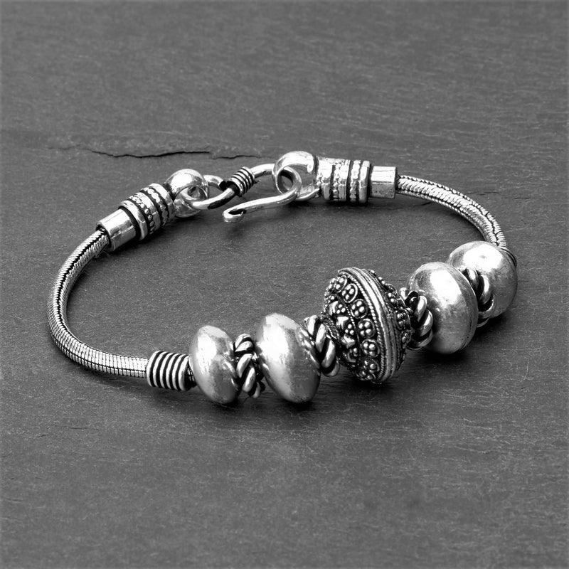 Handmade nickel free silver toned plated brass, decorative dotted bead, snake chain bracelet designed by OMishka.