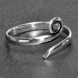 A simple, nickel free solid silver, single spiral wrap ring designed by OMishka.