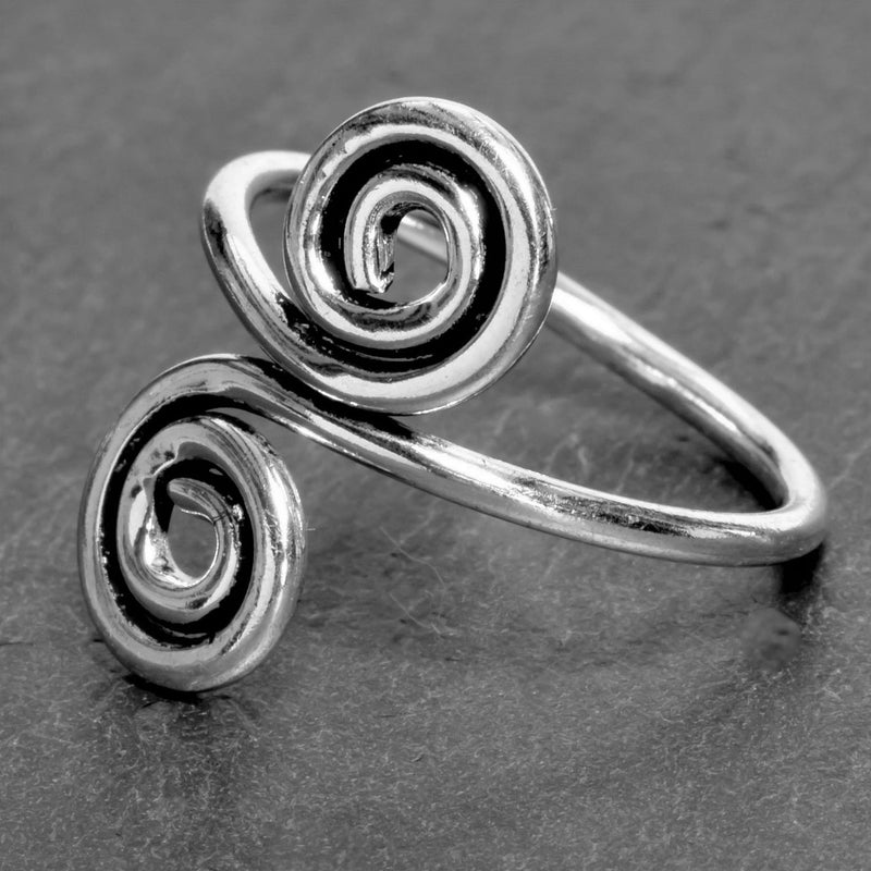 An adjustable, nickel free solid silver, double spiral wrap ring designed by OMishka.