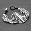 Handmade nickel free silver, striped multi strand, elegantly beaded bracelet designed by OMishka.