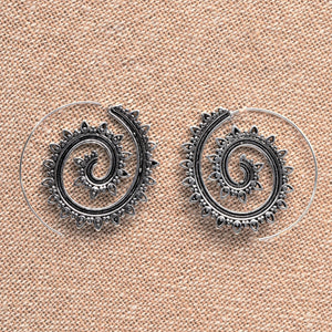 Handmade nickel free solid silver, tribal dotwork decorated, spiral hoop earrings designed by OMishka.