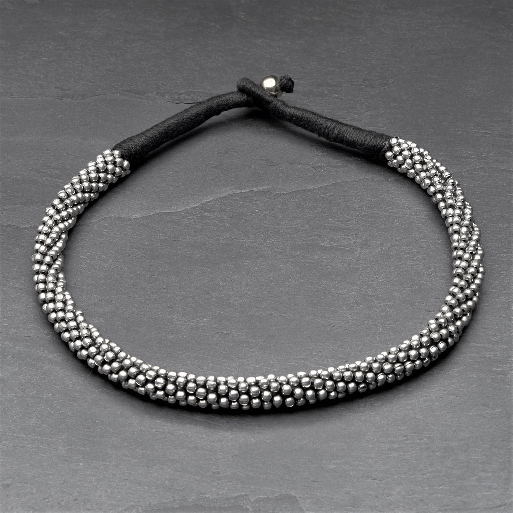 Handmade and nickel free, tiny silver beaded, black woven hemp cord, collar necklace designed by OMishka.