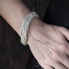 Artisan handmade silver toned, simple and elegant tiny cube beaded multi strand bracelet designed by OMishka.