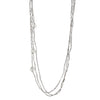 Handmade silver, tiny cube beaded and mini disc charm, three strand necklace designed by OMishka.