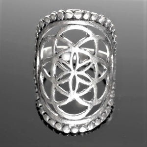 An adjustable, large, solid silver decorative beaded seed of life ring designed by OMishka.