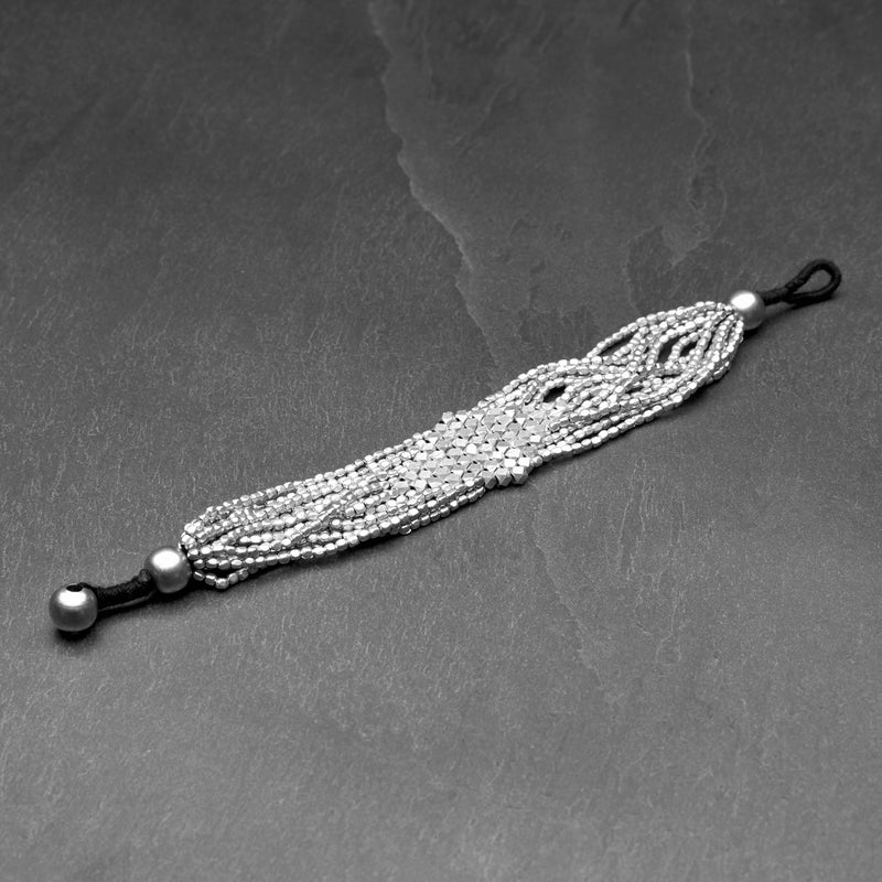 Naga tribe silver, elegantly beaded diamond cut, multi strand bracelet designed by OMishka.