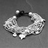 Handmade silver, chunky multi strand beaded, spiral charm bracelet designed by OMishka.