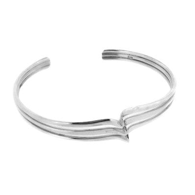 A silver triple wave open cuff bracelet designed by OMishka.