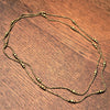 Handmade pure brass, simple single strand, long beaded necklace designed by OMishka.