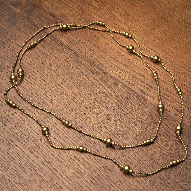 Handmade pure brass, long single strand, simple beaded wrap necklace designed by OMishka.