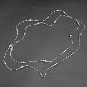 Simple, silver toned brass, single strand, long beaded wrap necklace designed by OMishka.