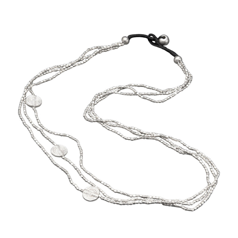 Simple, handmade silver, tiny cube beaded and mini disc charm, three strand necklace designed by OMishka.