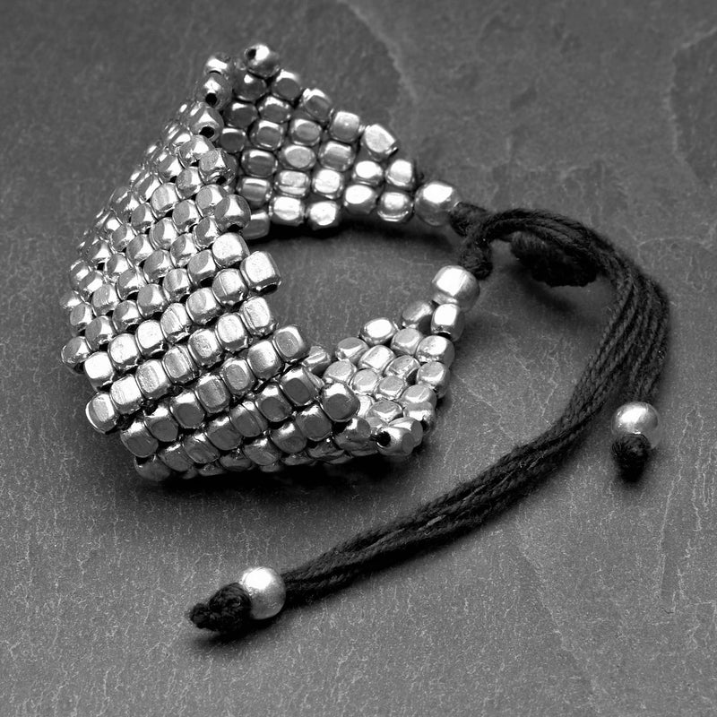 Artisan handmade silver cube beaded, Naga tribe woven adjustable drawstring bracelet designed by OMishka.