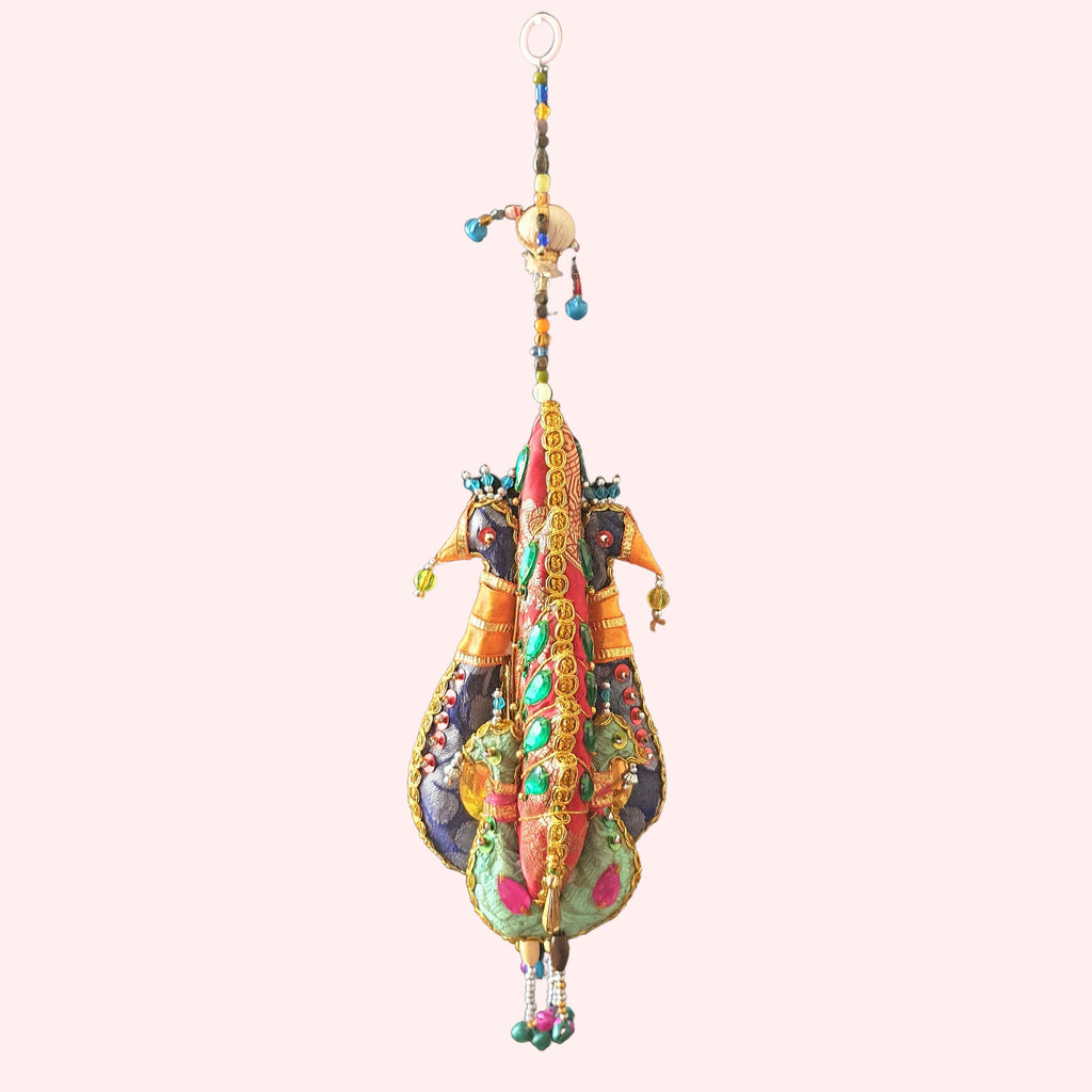 Indian handmade, colourful hanging large peacock family, recycled sari fabric and beaded sequins tota decoration.