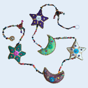 Indian artisan handmade, hanging string of moon and stars, recycled sari fabric and beaded sequins tota decoration.