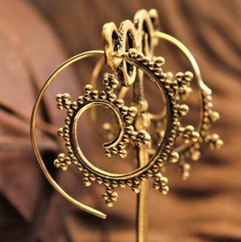 Large pure brass, dotted spiral hoop earrings designed by OMishka.